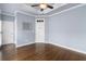 Bright bedroom with hardwood floors and window at 818 Highland Green Ne Way # 818, Atlanta, GA 30306