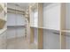 Large walk-in closet with ample shelving at 818 Highland Green Ne Way # 818, Atlanta, GA 30306