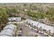 Aerial view of condo community showcasing building layout and landscaping at 4037 Woodridge Way, Tucker, GA 30084