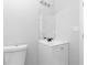 Well-lit bathroom with a white vanity at 8168 Canyon Forge Dr, Riverdale, GA 30274