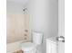 Bright bathroom featuring a shower-tub combo at 8168 Canyon Forge Dr, Riverdale, GA 30274