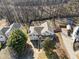 Aerial view of a two-story home, showcasing its landscaping and backyard at 232 Taylors Farm Dr, Canton, GA 30115