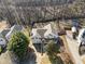 Aerial view showing house, yard, and driveway at 232 Taylors Farm Dr, Canton, GA 30115