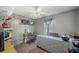 Bright room with shelving, window and ceiling fan provides a practical and comfortable space at 232 Taylors Farm Dr, Canton, GA 30115