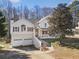 View of the home exterior showcasing the two-car garage and landscaping at 232 Taylors Farm Dr, Canton, GA 30115