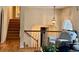 Open floorplan with staircase and archway into the living room at 232 Taylors Farm Dr, Canton, GA 30115