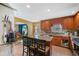 Kitchen with an island and view into the adjacent dining area at 232 Taylors Farm Dr, Canton, GA 30115