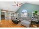 The living room features vaulted ceilings, a ceiling fan, and hardwood floors at 232 Taylors Farm Dr, Canton, GA 30115