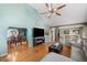 The living room flows into the dining room and features vaulted ceilings at 232 Taylors Farm Dr, Canton, GA 30115