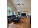 Inviting living room featuring hardwood floors, a fireplace, and lots of natural light at 232 Taylors Farm Dr, Canton, GA 30115