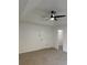 Bright bedroom with ceiling fan and walk-in closet at 235 Prestwyck Oak, Lawrenceville, GA 30043