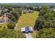 Aerial view of property with barn and large pasture at 3842 Ernest W Barrett Sw Pkwy, Marietta, GA 30064