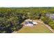 Aerial view of a white barn with a two-toned roof at 3842 Ernest W Barrett Sw Pkwy, Marietta, GA 30064