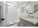 Basement bathroom with white subway tile shower and gray vanity at 3842 Ernest W Barrett Sw Pkwy, Marietta, GA 30064