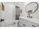 Clean bathroom with white subway tile and a modern vanity at 3842 Ernest W Barrett Sw Pkwy, Marietta, GA 30064