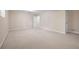 Large finished basement bedroom featuring neutral walls and carpeted floors at 4698 Norman Nw Dr, Kennesaw, GA 30144