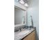 Small bathroom with granite vanity and updated fixtures at 4698 Norman Nw Dr, Kennesaw, GA 30144