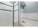 Bathroom with walk-in shower and built-in bench at 4698 Norman Nw Dr, Kennesaw, GA 30144