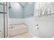 Bathroom with soaking tub, shower, and white subway tile at 4698 Norman Nw Dr, Kennesaw, GA 30144