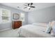 Bedroom with two twin beds and a dresser at 4698 Norman Nw Dr, Kennesaw, GA 30144