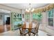 Bright breakfast nook with built-in hutch and view of woods at 4698 Norman Nw Dr, Kennesaw, GA 30144