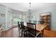 Formal dining room with hardwood floors and a large window at 4698 Norman Nw Dr, Kennesaw, GA 30144