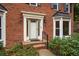 Inviting front entrance with a brick facade and a white door at 4698 Norman Nw Dr, Kennesaw, GA 30144