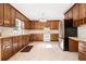 Kitchen boasts stainless steel appliances and wood cabinetry at 4698 Norman Nw Dr, Kennesaw, GA 30144