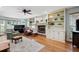 Living room with hardwood floors, built-ins, and fireplace at 4698 Norman Nw Dr, Kennesaw, GA 30144