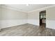 Bright dining room with hardwood floors and wainscoting at 93 Carriage Lake Dr, Stockbridge, GA 30281