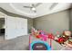 Spacious playroom with toys and a mini trampoline at 93 Carriage Lake Dr, Stockbridge, GA 30281