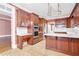 Kitchen with island, double ovens, and custom cabinetry at 1000 Riverside Rd, Roswell, GA 30076