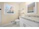 Bathroom featuring granite countertops, white cabinets, and neutral paint at 2355 Henderson Mill Ne Rd # 6, Atlanta, GA 30345