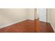 Bedroom featuring hardwood floors and base trim at 2355 Henderson Mill Ne Rd # 6, Atlanta, GA 30345