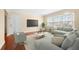 Cozy living room with stylish furniture and a large window for plenty of light at 2355 Henderson Mill Ne Rd # 6, Atlanta, GA 30345