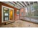 Enclosed brick patio with wooden ceiling and sliding door access to the home at 2355 Henderson Mill Ne Rd # 6, Atlanta, GA 30345