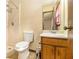 Bathroom with shower/tub combo and wood vanity at 3321 N Hampton Sw Pl, Marietta, GA 30064