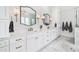 Elegant bathroom boasts double vanity, marble floors, and modern fixtures at 1445 Hillside Dr, Grayson, GA 30017