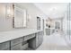 Elegant bathroom with gray cabinets and marble flooring at 1445 Hillside Dr, Grayson, GA 30017