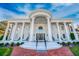 Impressive white mansion with columns and grand entrance at 1445 Hillside Dr, Grayson, GA 30017