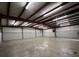 Spacious workshop with high ceilings and concrete floor at 1445 Hillside Dr, Grayson, GA 30017