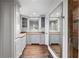 Bathroom featuring granite countertops, grey cabinetry, and a glass shower stall with tiled walls at 2468 Ridgeway Dr, Atlanta, GA 30360