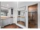 Bathroom featuring granite countertops, grey cabinetry, and a glass shower stall with tiled walls at 2468 Ridgeway Dr, Atlanta, GA 30360