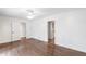 Bedroom with hardwood floors and access to ensuite bathroom and closet at 2468 Ridgeway Dr, Atlanta, GA 30360