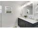 Modern bathroom with double vanity and marble countertops at 2488 Elizabeth Ann Ne Ln, Atlanta, GA 30324