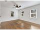 Well-lit bedroom, hardwood floors, and three windows at 2488 Elizabeth Ann Ne Ln, Atlanta, GA 30324