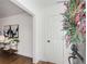 Bright and airy entryway with hardwood floors and a modern glass console table at 2488 Elizabeth Ann Ne Ln, Atlanta, GA 30324