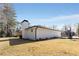 House exterior showcasing white brick and landscaping at 2488 Elizabeth Ann Ne Ln, Atlanta, GA 30324