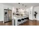 Modern kitchen with white cabinets, granite counters & island at 2488 Elizabeth Ann Ne Ln, Atlanta, GA 30324