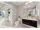 Modern bathroom with floating vanity and marble tile at 3324 Peachtree Ne Rd # 1114, Atlanta, GA 30326